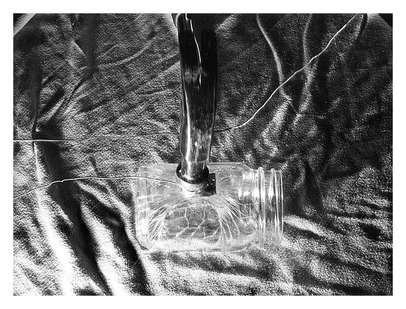 Hammer crushing a glass jar Hammer hitting glass jar